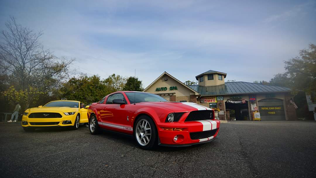 Newburgh Auto Spa facility with red Mustang